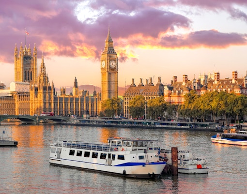 River cruise on the Thames with view of Big Ben and Houses of Parliament, London.