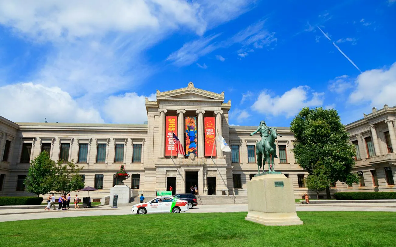 Museum of Fine Arts Boston exterior with equestrian statue, part of self-guided city exploration game.