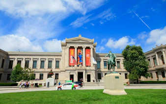 Museum of Fine Arts Boston exterior with equestrian statue, part of self-guided city exploration game.