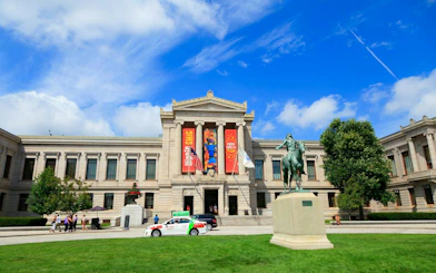 Museum of Fine Arts Boston exterior with equestrian statue, part of self-guided city exploration game.