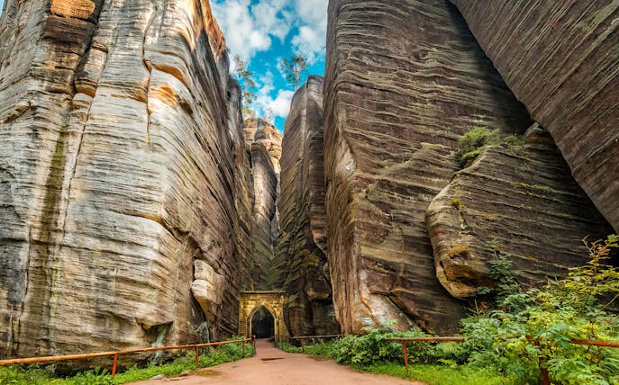 Adrspach rock formations with narrow path and archway, Czech Republic.