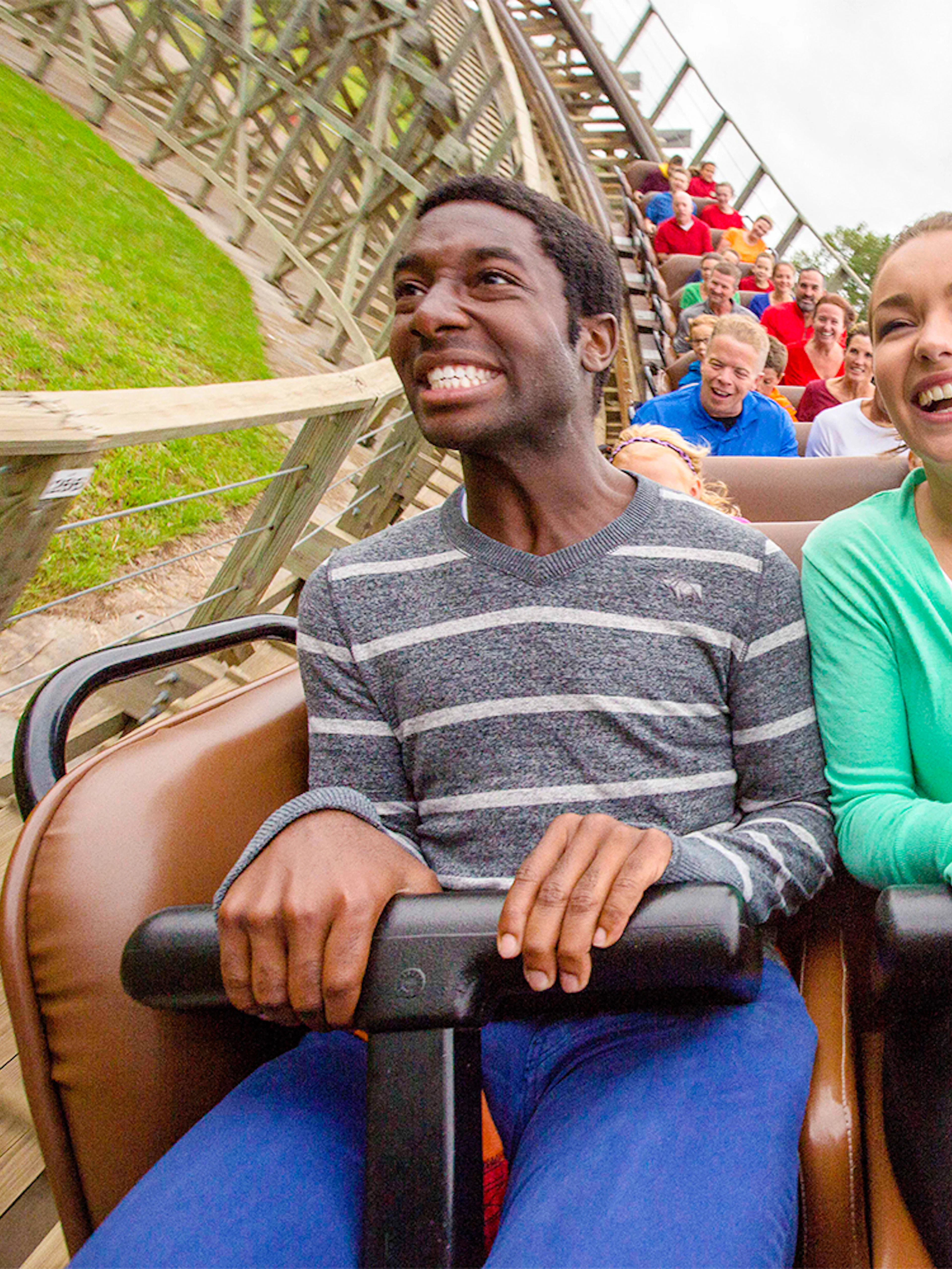 Visitors enjoying the Predator roller coaster at Six Flags Darien Lake.