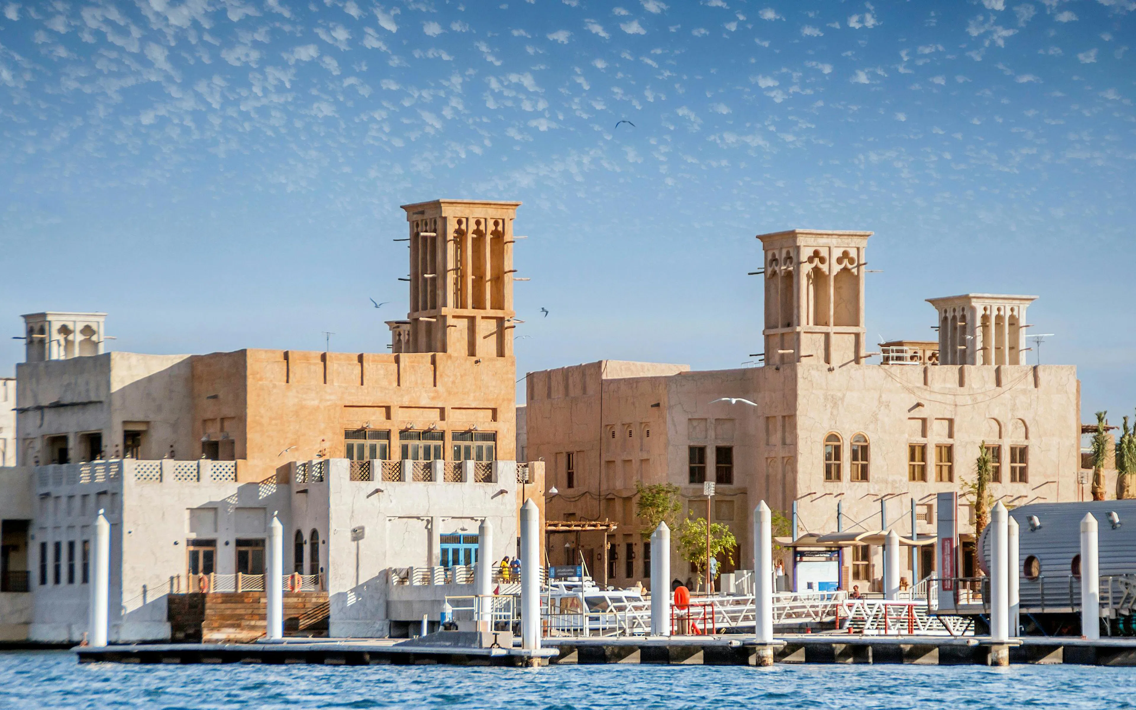 Al Fahidi Historical District wind towers and waterfront in Bastakiya, Dubai.