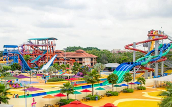 Water slides and colorful attractions at Wild Wild Wet water park in Singapore.