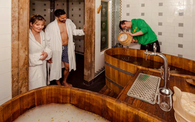 Guests enjoying Szechenyi Spa Beer Spa Experience in Budapest, Hungary.