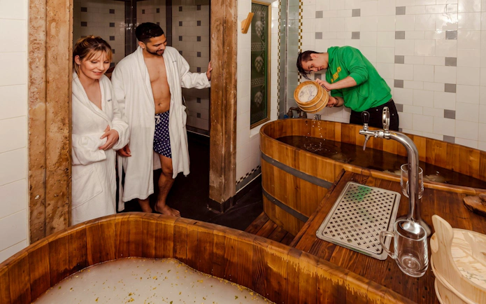 Guests enjoying Szechenyi Spa Beer Spa Experience in Budapest, Hungary.