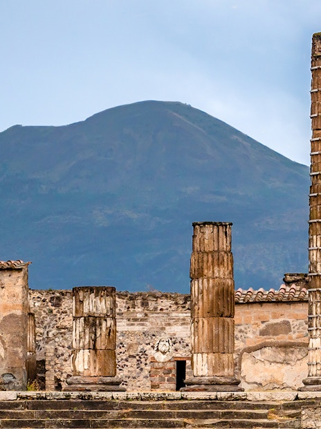 Ancient ruins of Pompeii with Mount Vesuvius in the background, Naples, Italy.