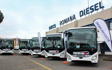 Terravision buses parked at Iveco Romana Diesel, ready for airport transfers.