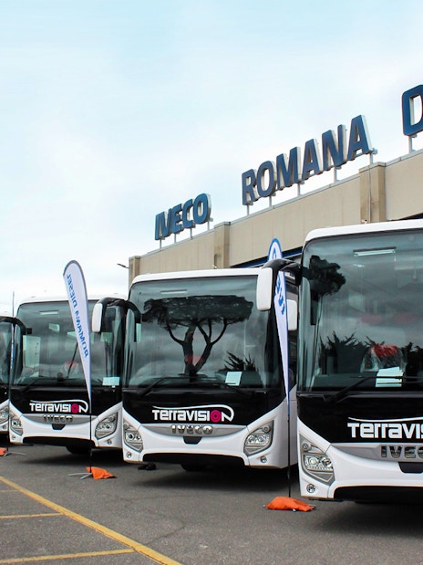 Terravision buses parked at Iveco Romana Diesel, ready for airport transfers.