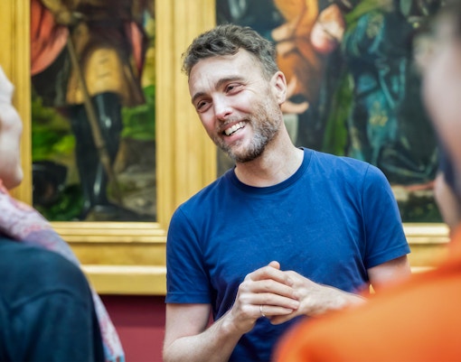 Ground Zero guided tour group at 9/11 Memorial, New York City, with skip-the-line museum tickets.