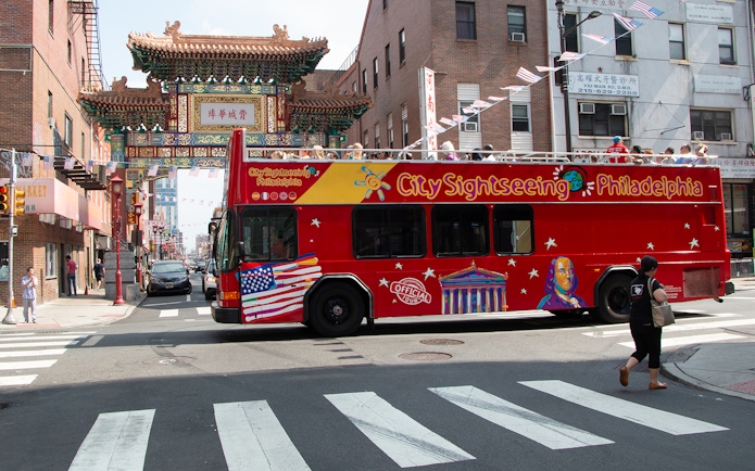 Philadelphia sightseeing bus near Chinatown Friendship Gate on Hop-On-Hop-Off Tour.