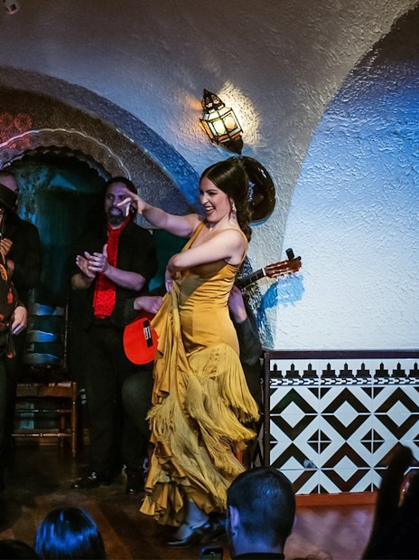 Flamenco dancers performing at Tablao Cordobes in a vibrant show.