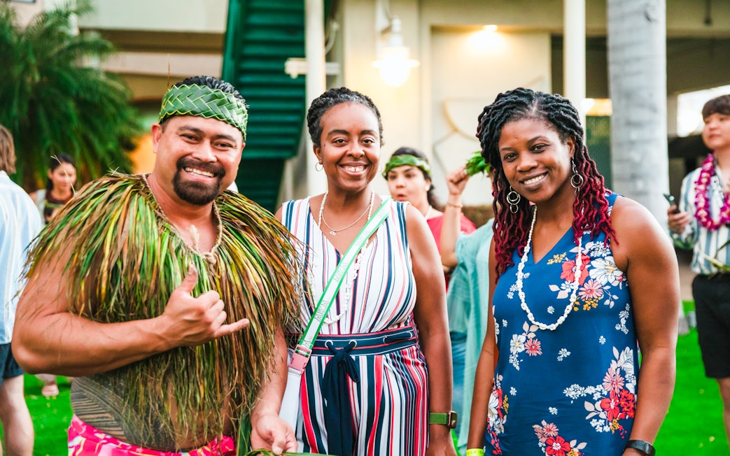 Guests enjoying a traditional Hawaiian luau at Moana Luau, Hawaii.