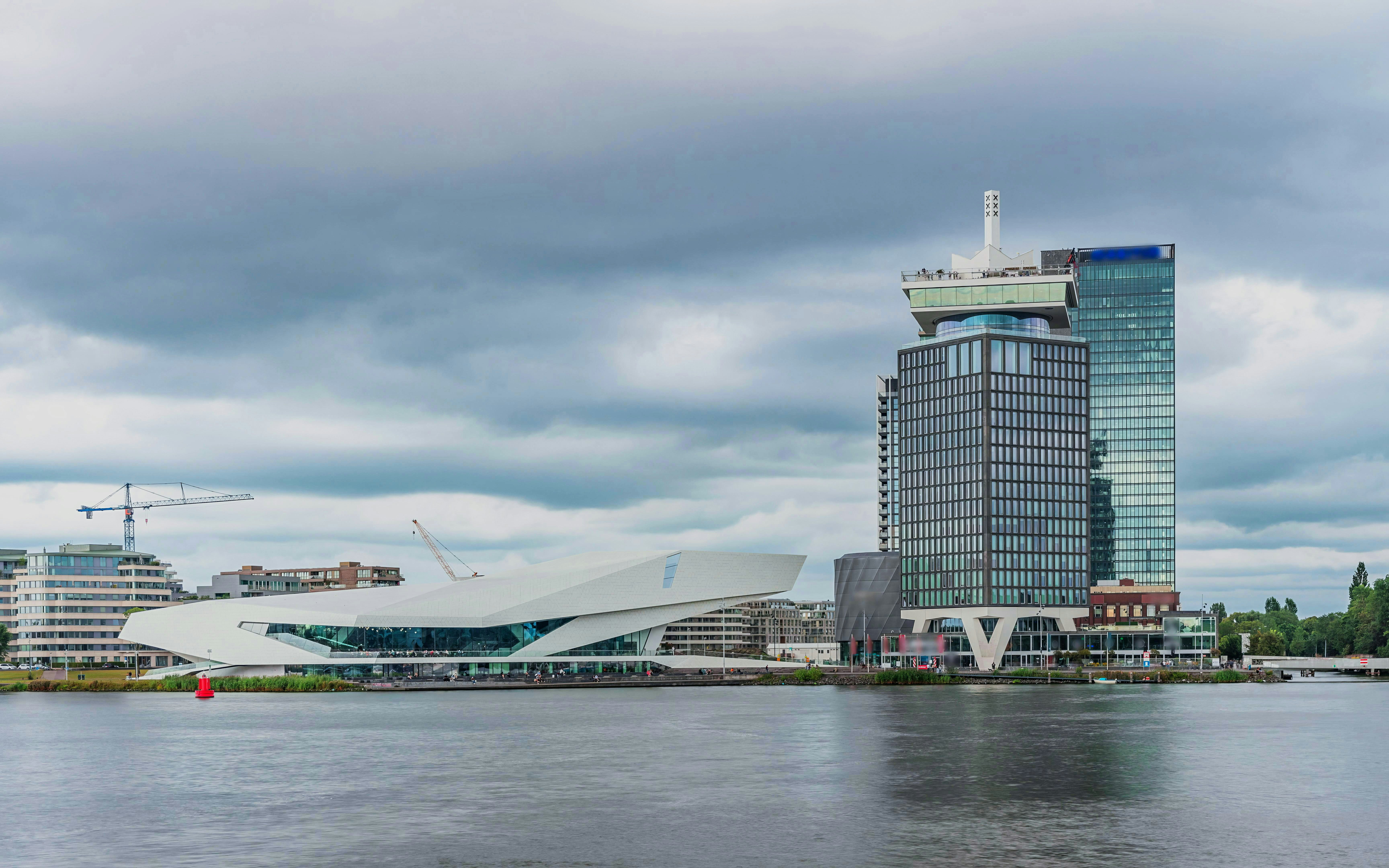 Amsterdam skyline with A'dam Lookout Tower and Eye Film Museum by the river.