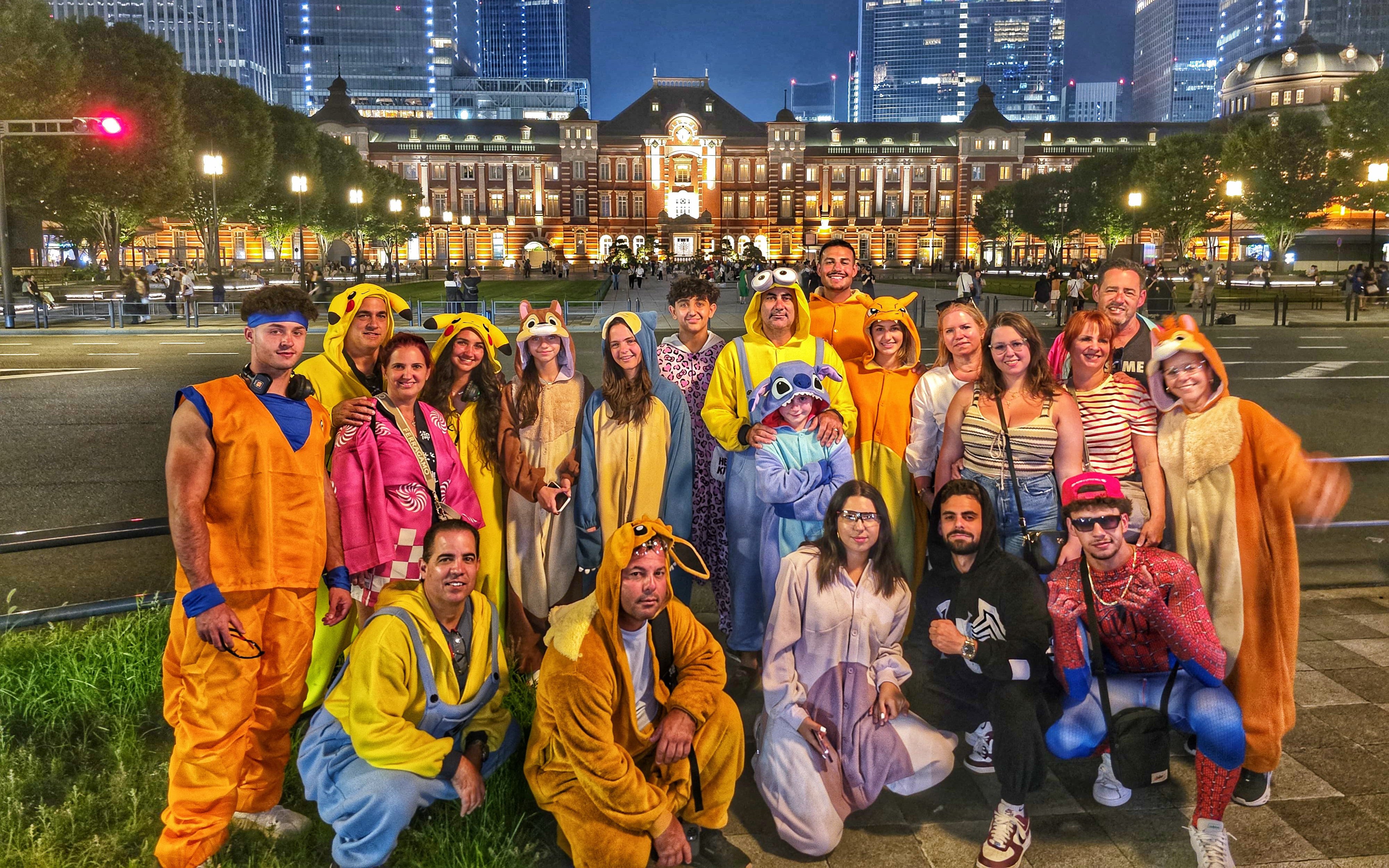 Group in costumes posing in front of Tokyo Station during Go Kart Tokyo Old Town Tour.