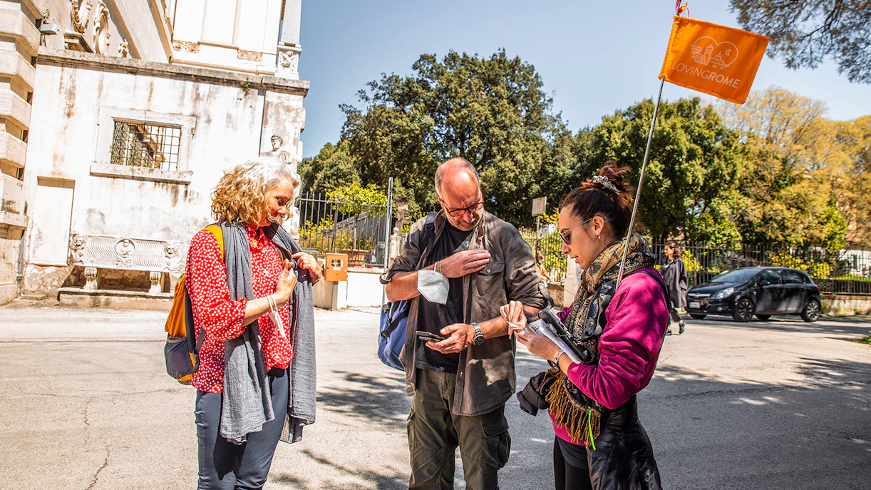 Visitors preparing for a Borghese Gallery tour with a guide in Rome.