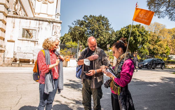 Visitors preparing for a Borghese Gallery tour with a guide in Rome.