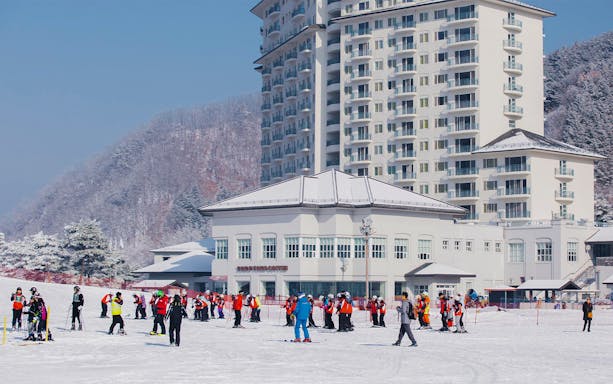 Skiers gather at Elysian Gangchon Ski Resort on Nami Island, South Korea.
