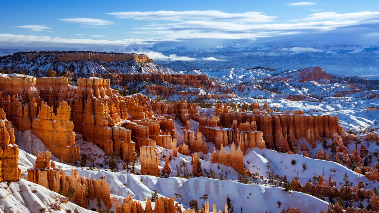 Grand Canyon covered in snow during winter, showcasing the canyon's vast landscape and unique seasonal beauty.