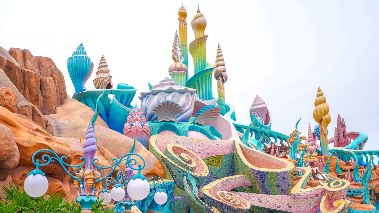 Colorful seashell-themed architecture at Tokyo Disneyland's Mermaid Lagoon.