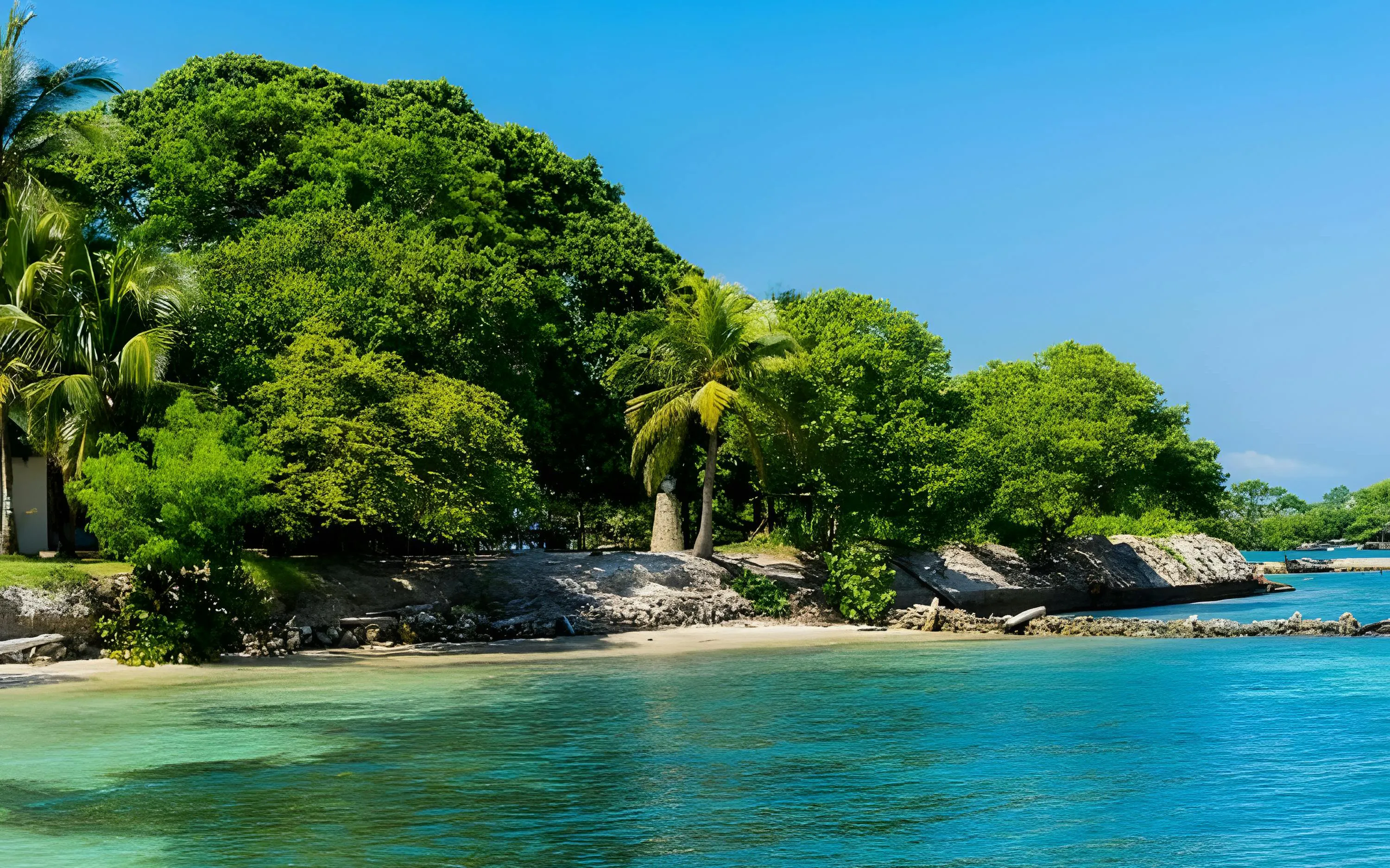 Clear blue water and lush greenery of Rosario Island, Cartagena, Colombia.