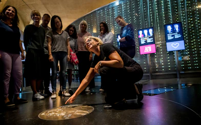 Visitors exploring the Nobel Prize Museum in Stockholm.