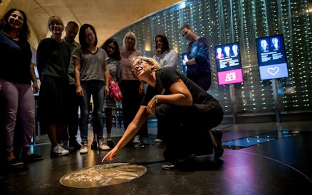 Visitors exploring the Nobel Prize Museum in Stockholm.