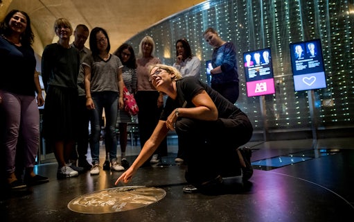 Visitors exploring the Nobel Prize Museum in Stockholm.