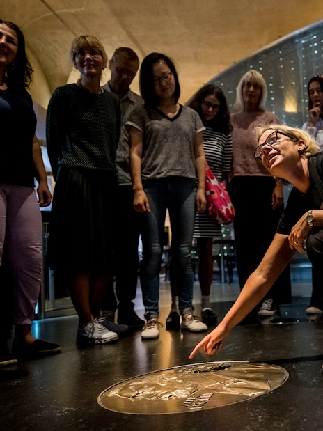 Visitors exploring the Nobel Prize Museum in Stockholm.