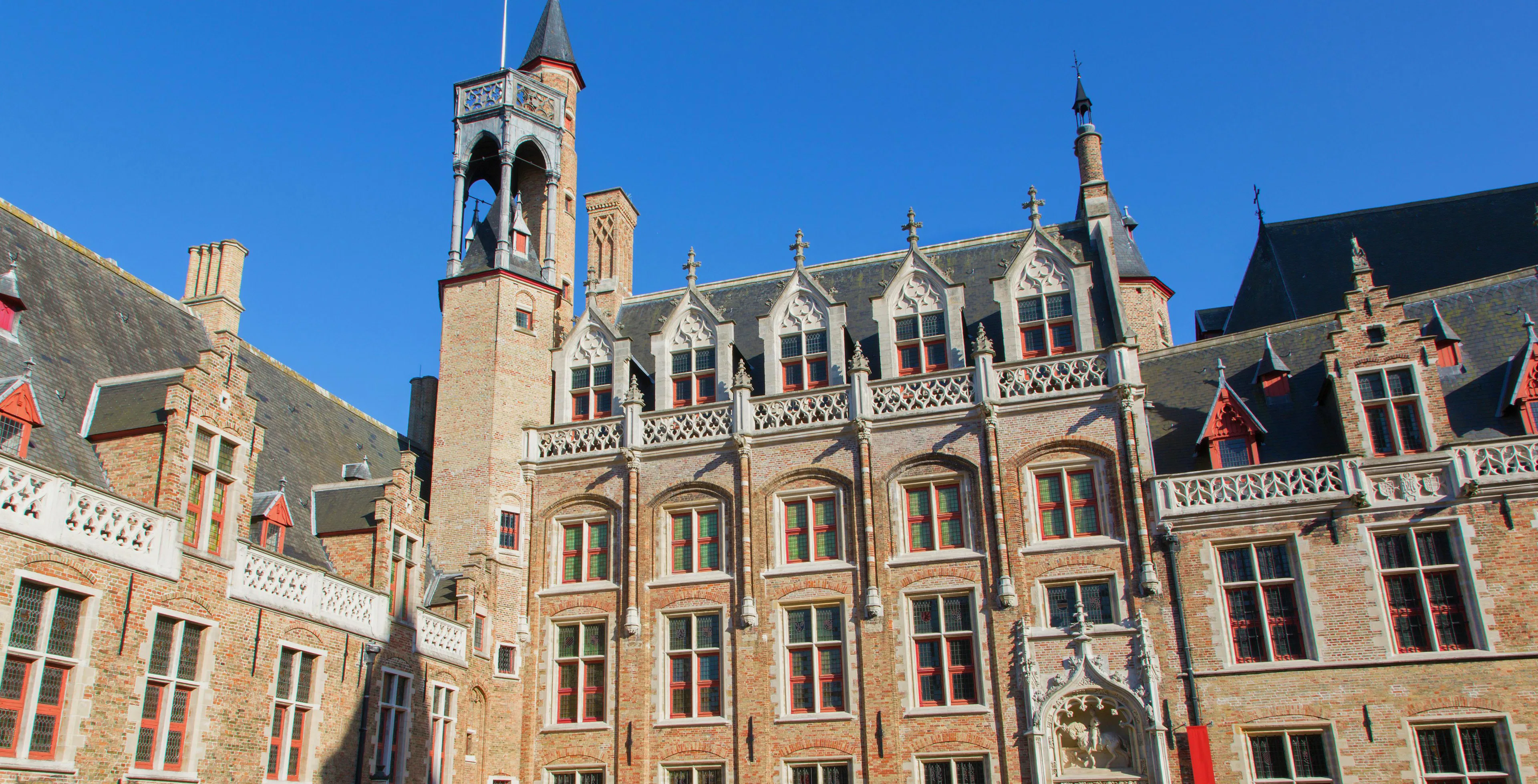 Gruuthusemuseum facade with Gothic architecture in Bruges, Belgium.
