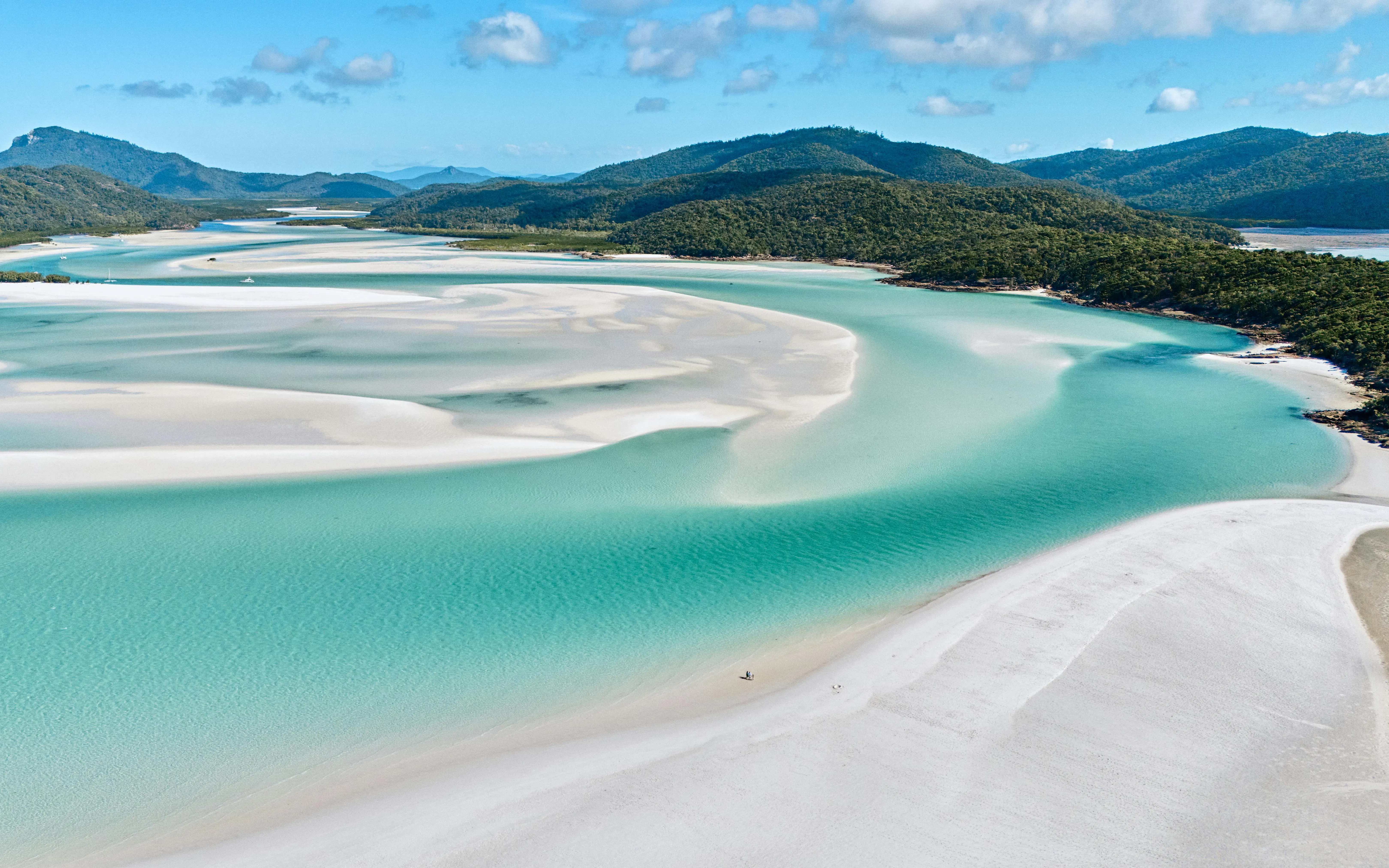 Whitehaven Beach and Hill Inlet with turquoise waters and white sands, Whitsundays Island.