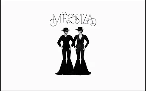 Two figures in black outfits and hats under the Mestiza logo, Ibiza.