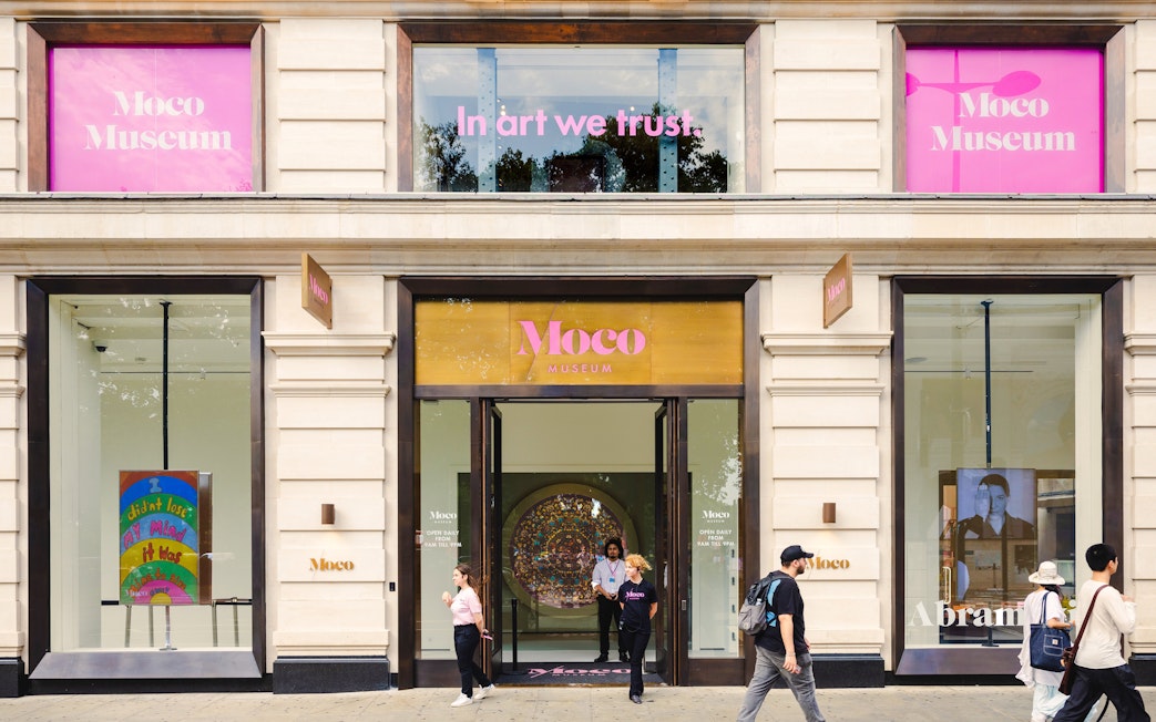 Moco Museum London exterior with visitors and art displays.