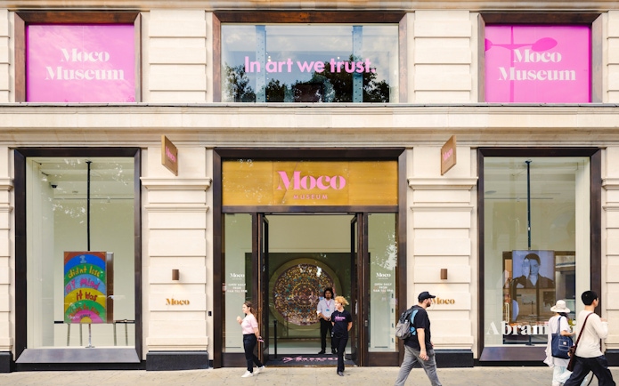 Moco Museum London exterior with visitors and art displays.