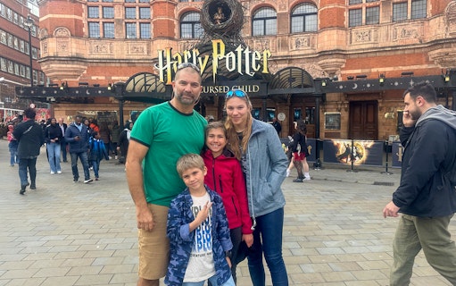 Cambridge Theater entrance with Harry Potter and the Cursed Child signage.