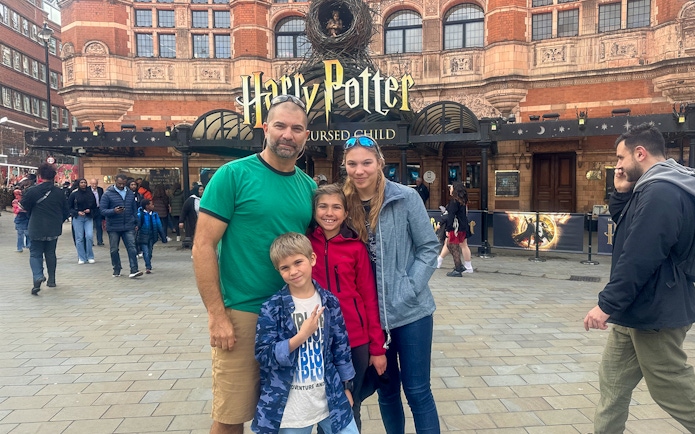 Cambridge Theater entrance with Harry Potter and the Cursed Child signage.