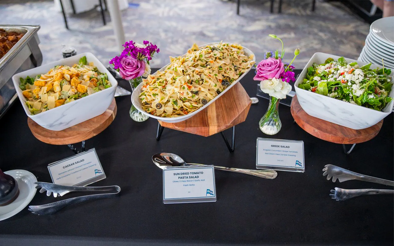 Buffet with Caesar, sun-dried tomato pasta, and Greek salads on San Diego Signature Dinner Cruise.