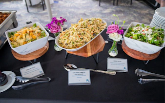Buffet with Caesar, sun-dried tomato pasta, and Greek salads on San Diego Signature Dinner Cruise.