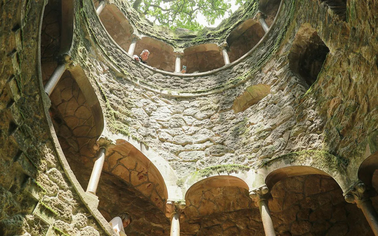Quinta da Regaleira's Initiation Well, Sintra, viewed from below during a private tour.