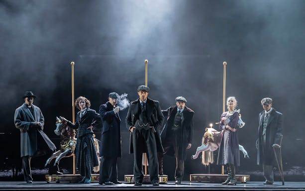 Stage performance of Peaky Blinders: The Redemption of Thomas Shelby with actors in period costumes.