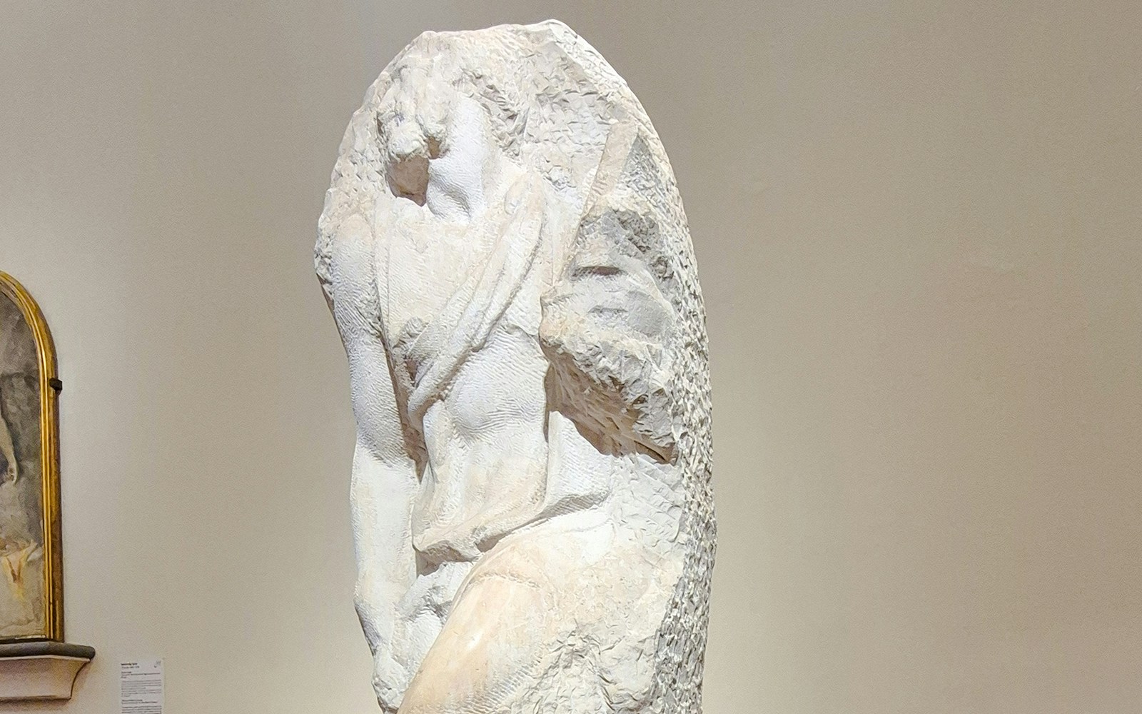 Awakening Slave sculpture by Michelangelo in Accademia Gallery, Florence.