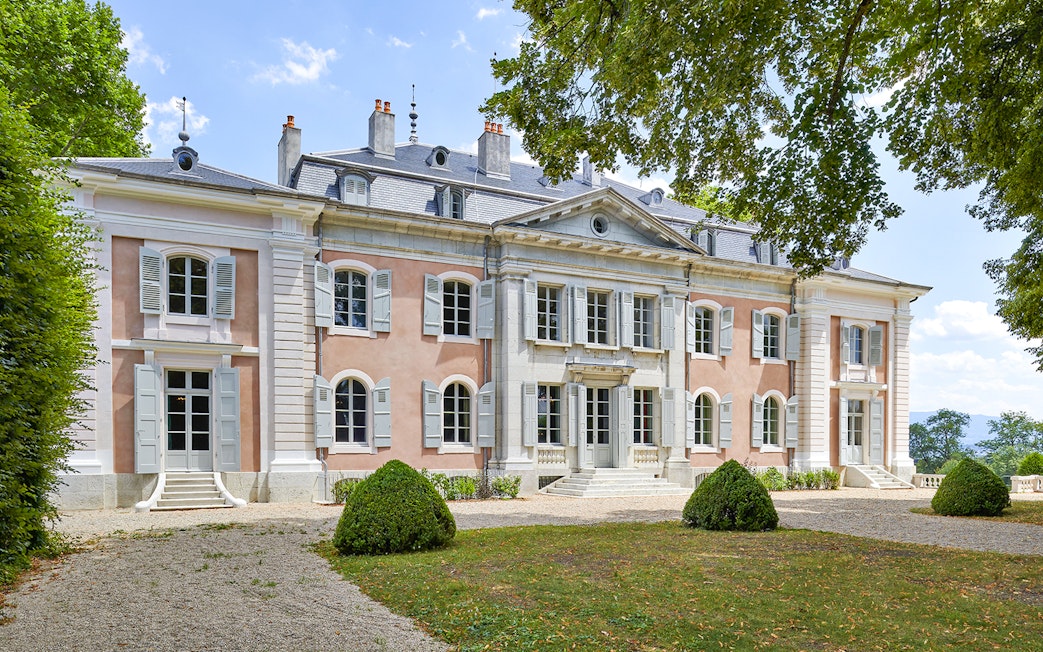 Voltaire's castle facade with garden, Ferney-Voltaire, France.
