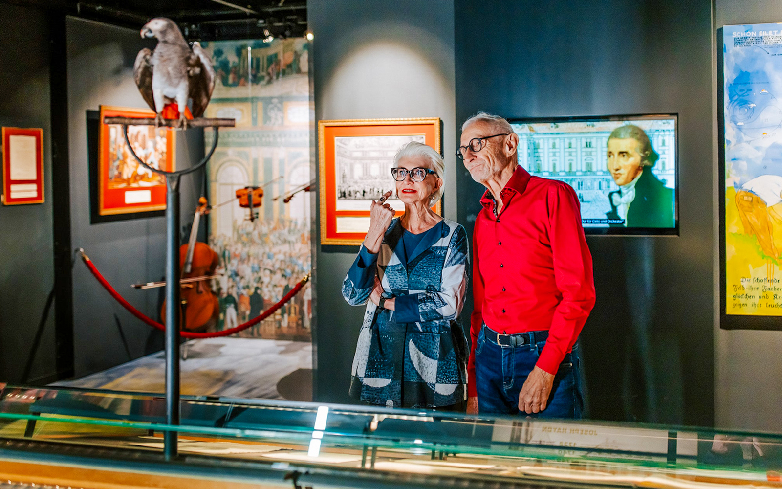 Guests observing exhibits inside Haus der Musik, Vienna.