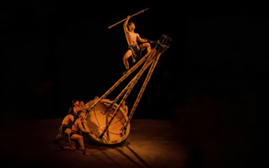 Performers at Teh Dar Vietnamese Bamboo Circus under iconic dome.