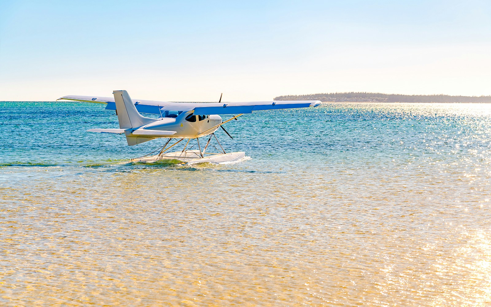Seaplane on turquoise waters during scenic tour, Mauritius.