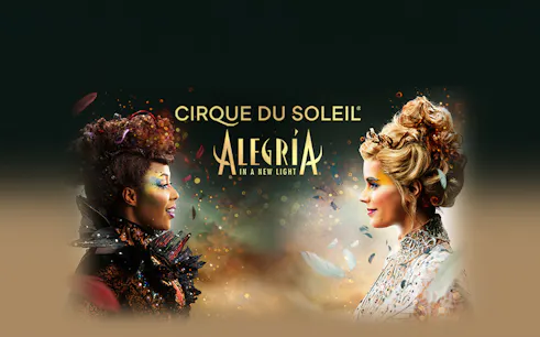 Cirque du Soleil Alegría performers facing each other, Seville show.