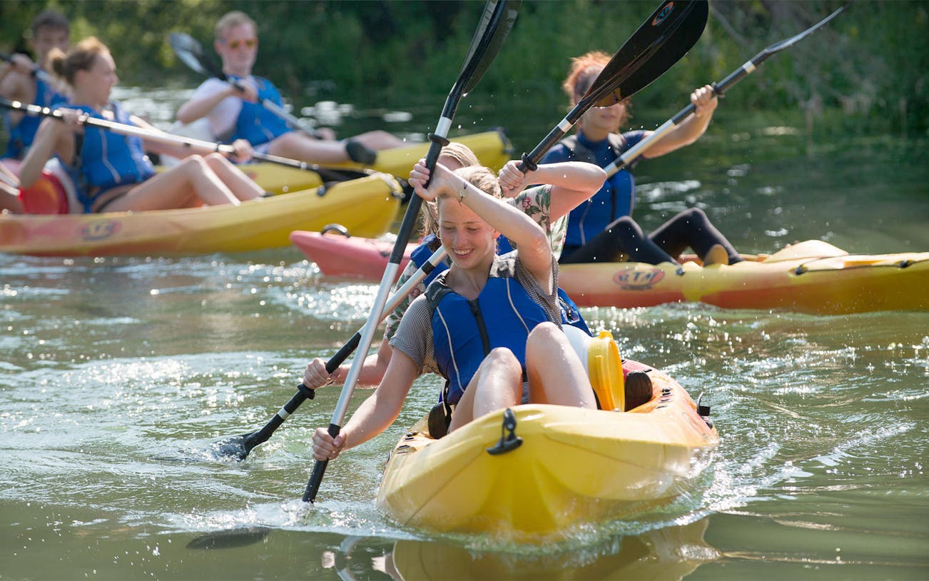 Kayakers paddling in the Adriatic Sea near Podstrana.
