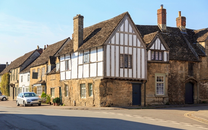 Historic Cotswold stone houses in a quaint English village near Stonehenge.