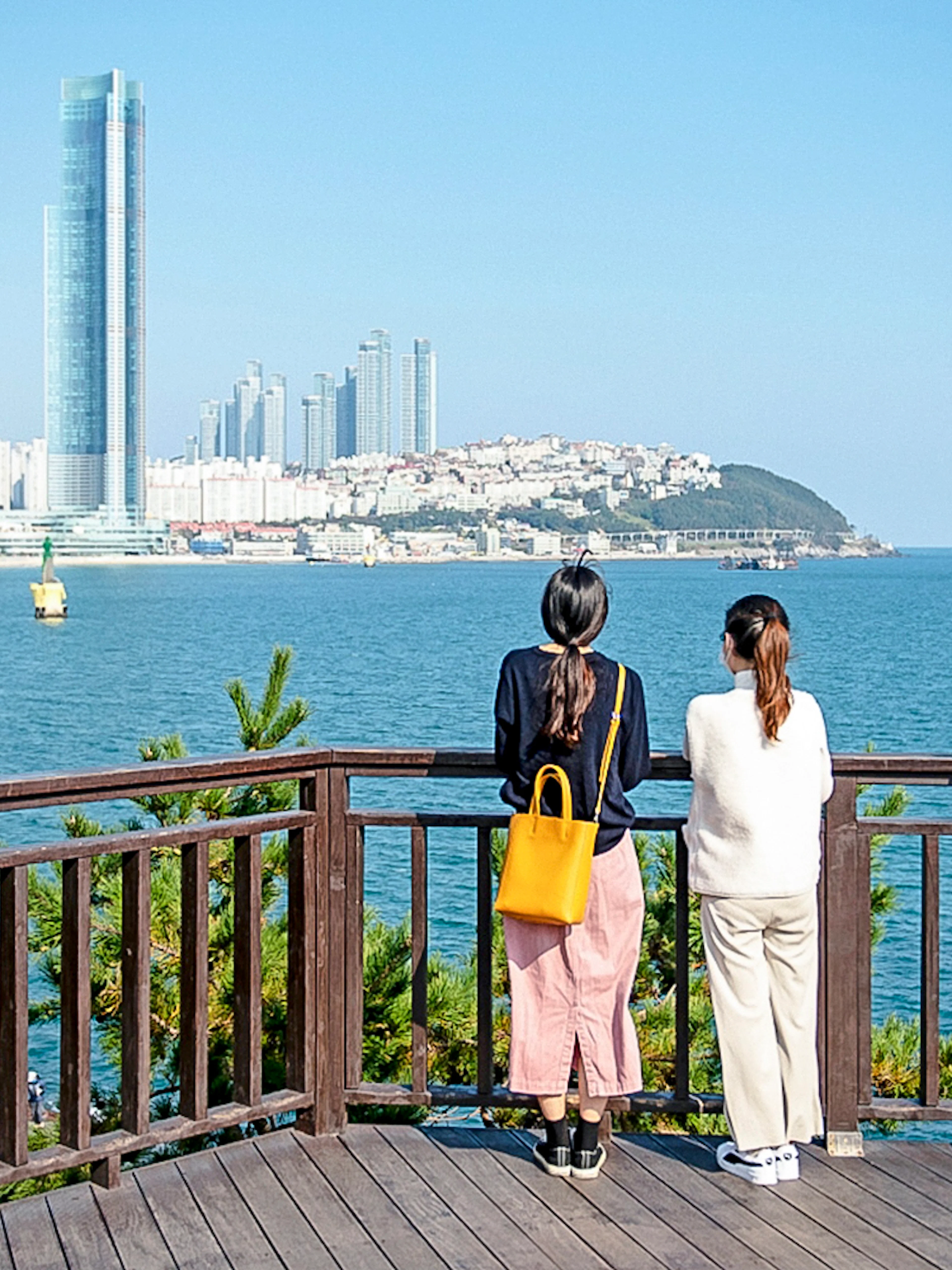 Viewing platform overlooking Haeundae Beach and skyscrapers in Busan, South Korea.
