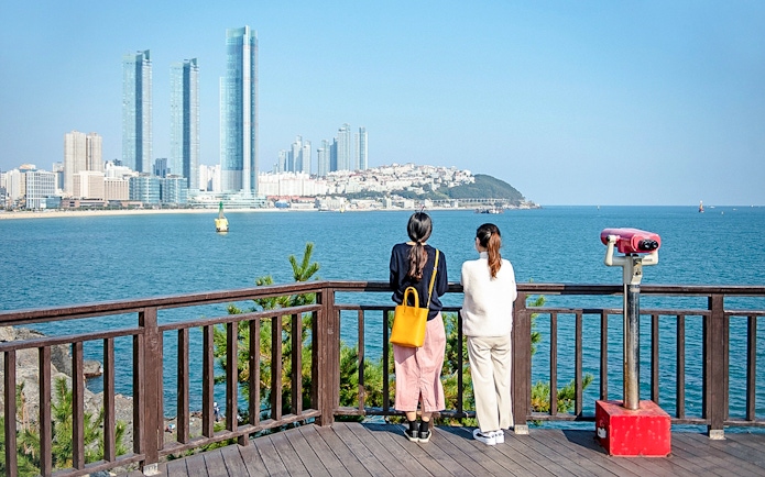 Viewing platform overlooking Haeundae Beach and skyscrapers in Busan, South Korea.